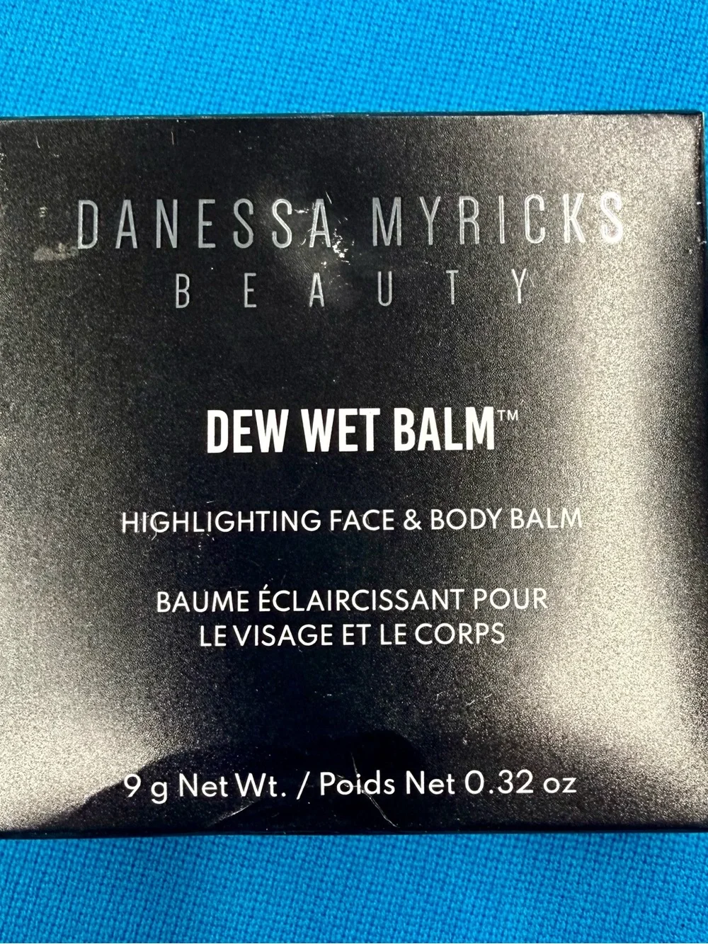 Danessa Myricks Beauty Dew Wet Balm - Black and White Text Packaging